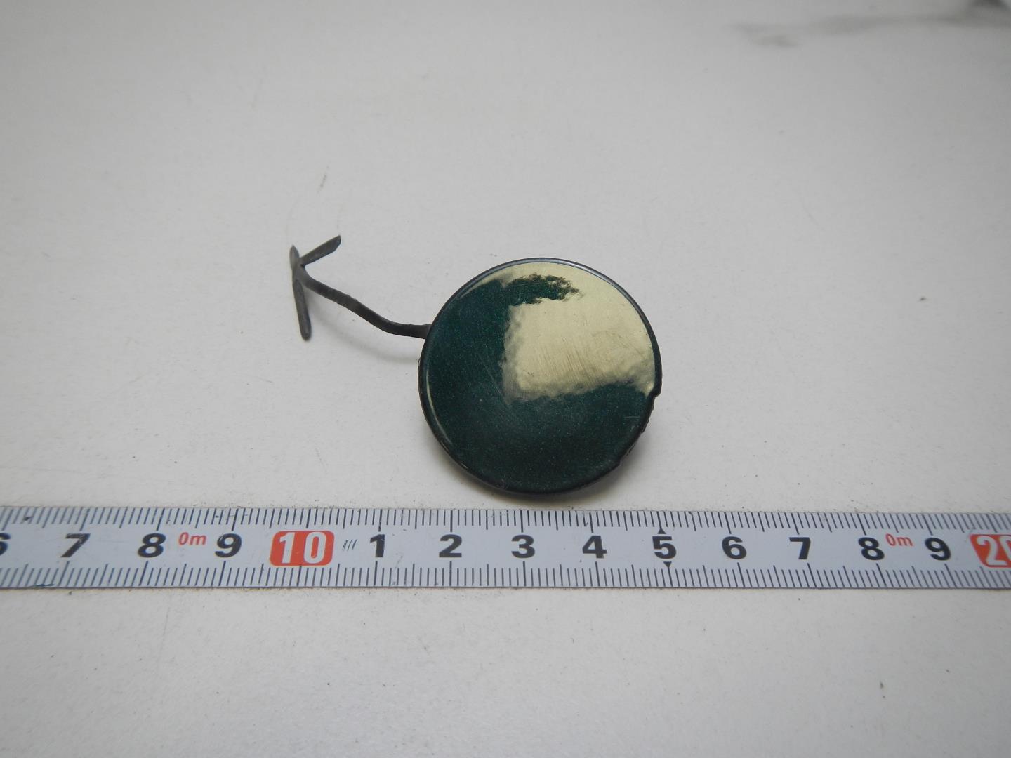 Заглушка буксировочного крюка