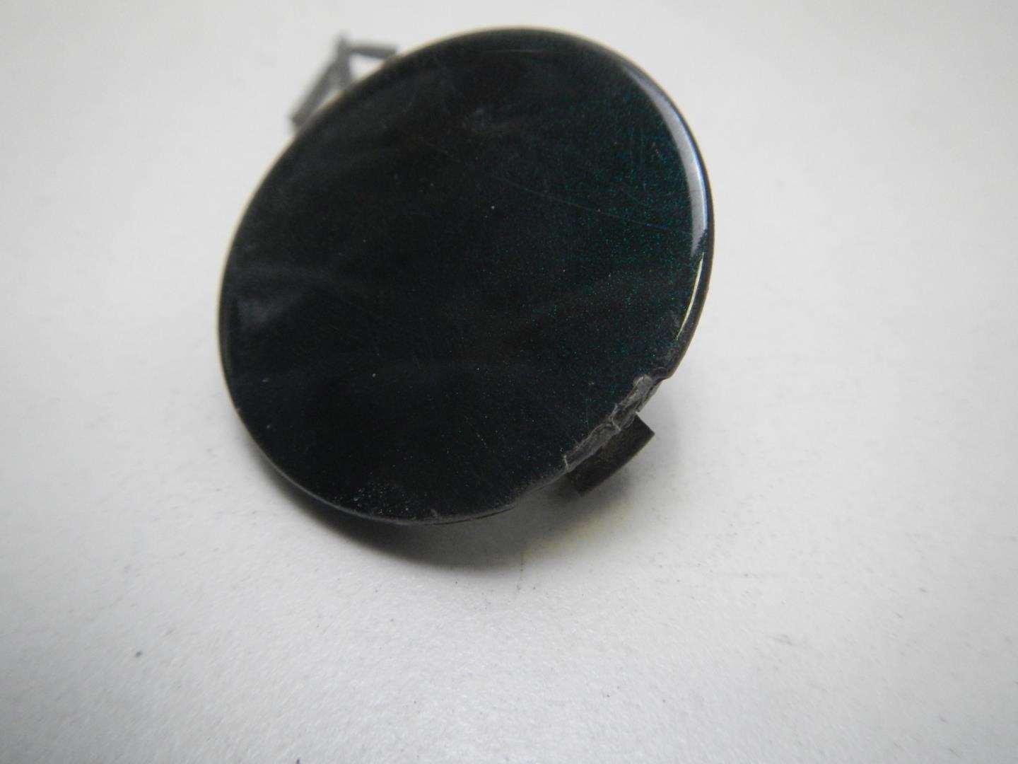 Заглушка буксировочного крюка