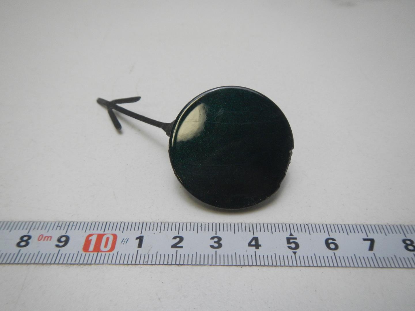 Заглушка буксировочного крюка