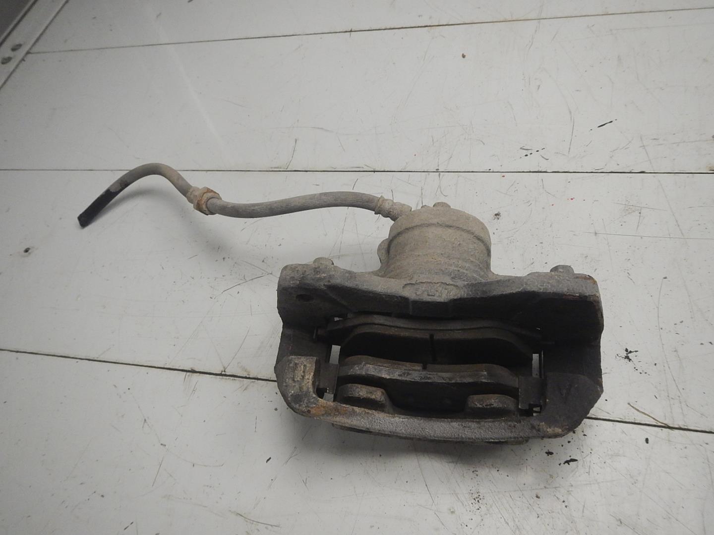 Суппорт передний левый