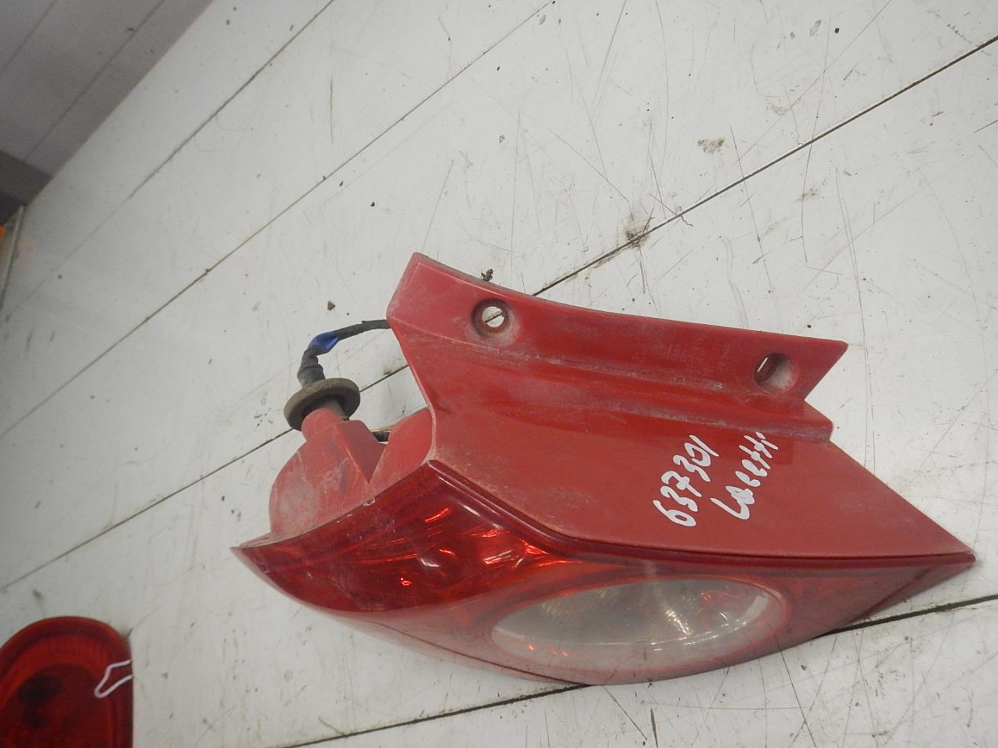 Фонарь задний левый