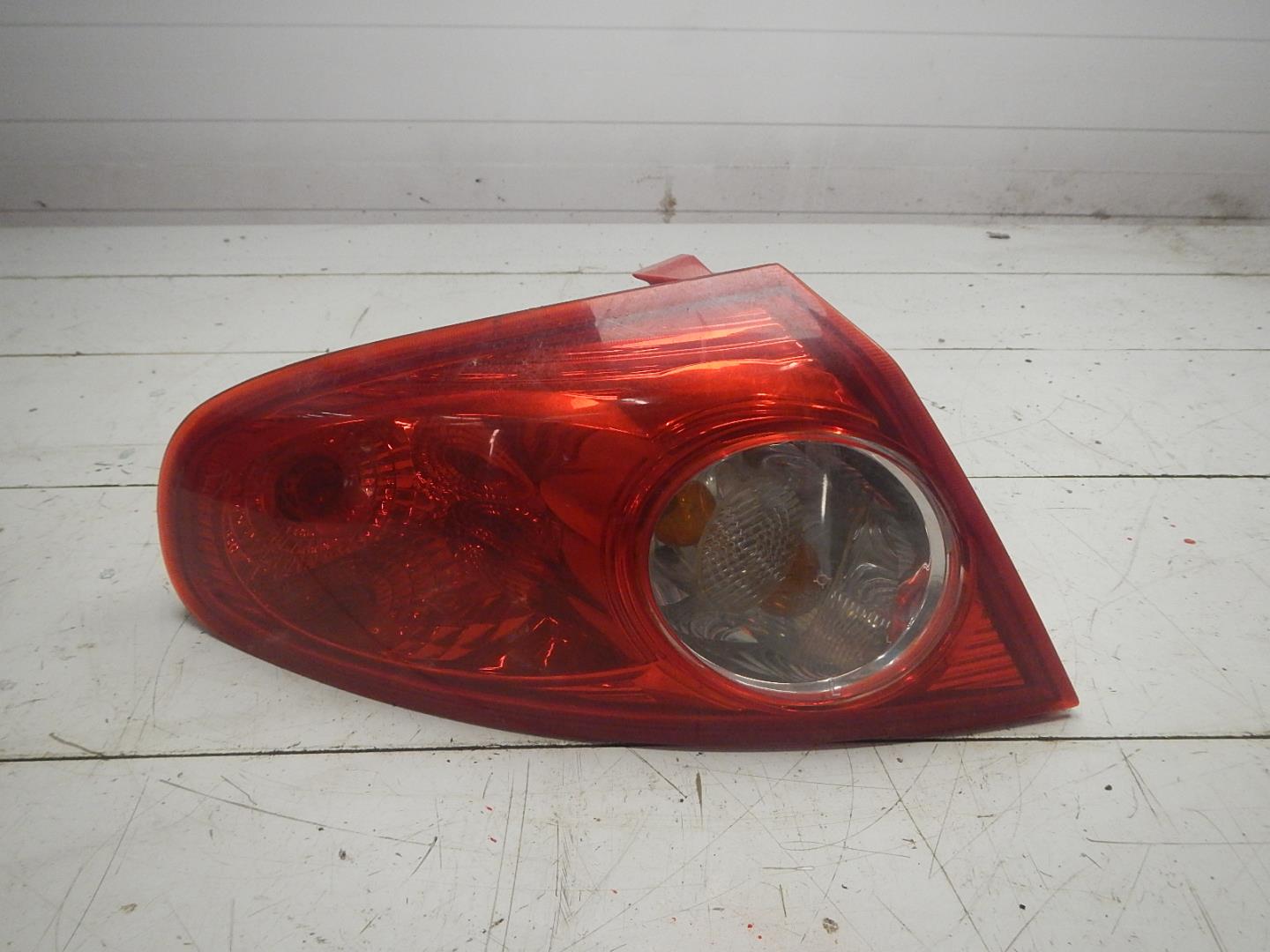 Фонарь задний левый