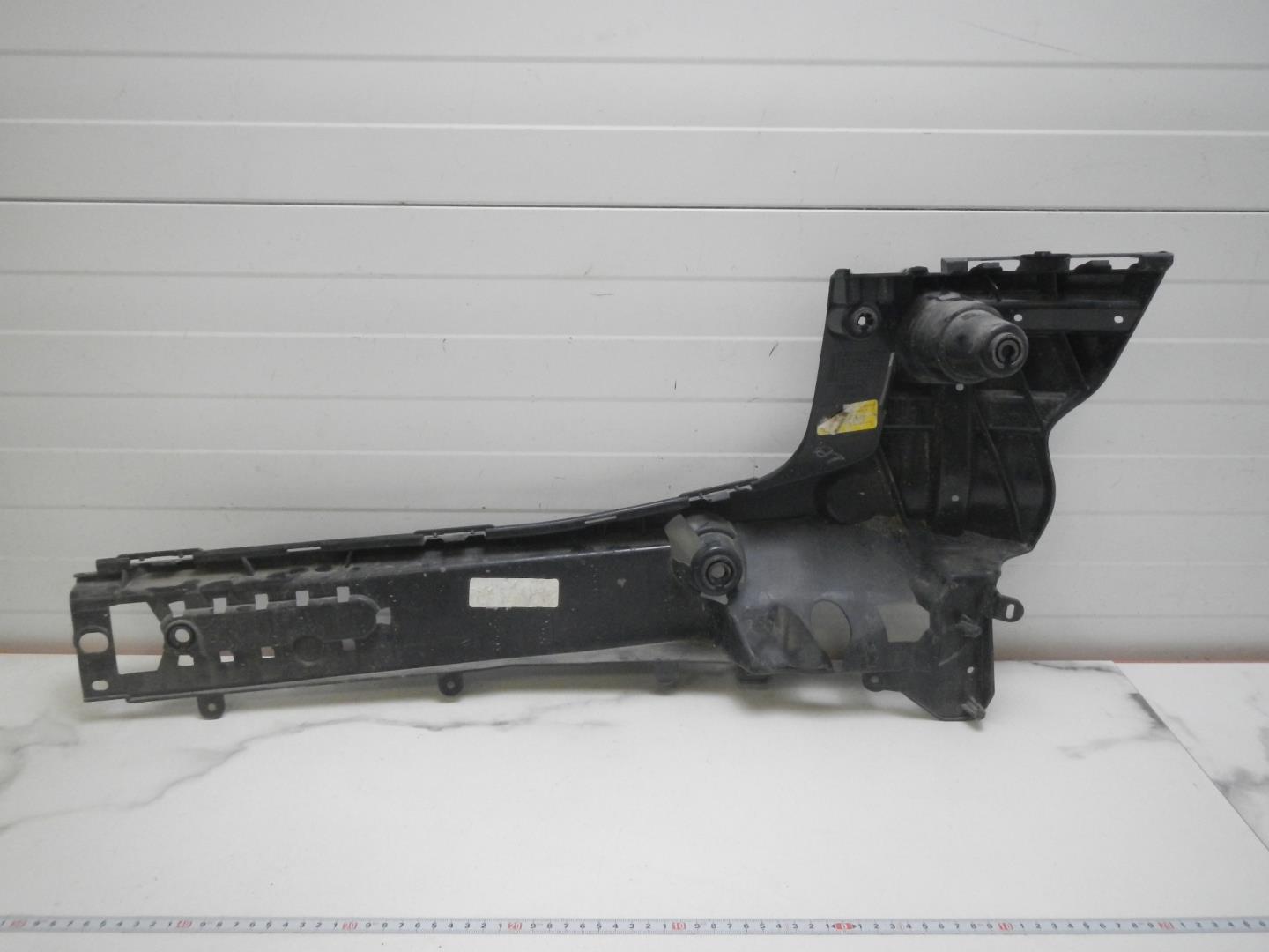 Кронштейн заднего бампера левый