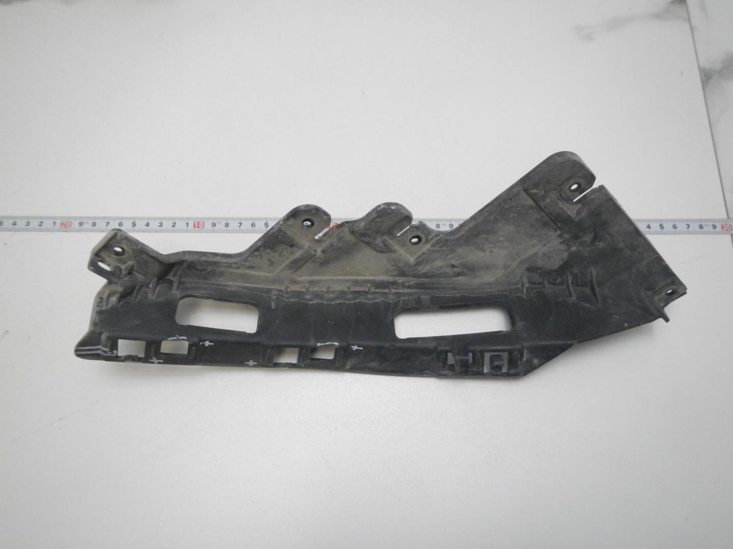 Кронштейн фар левый