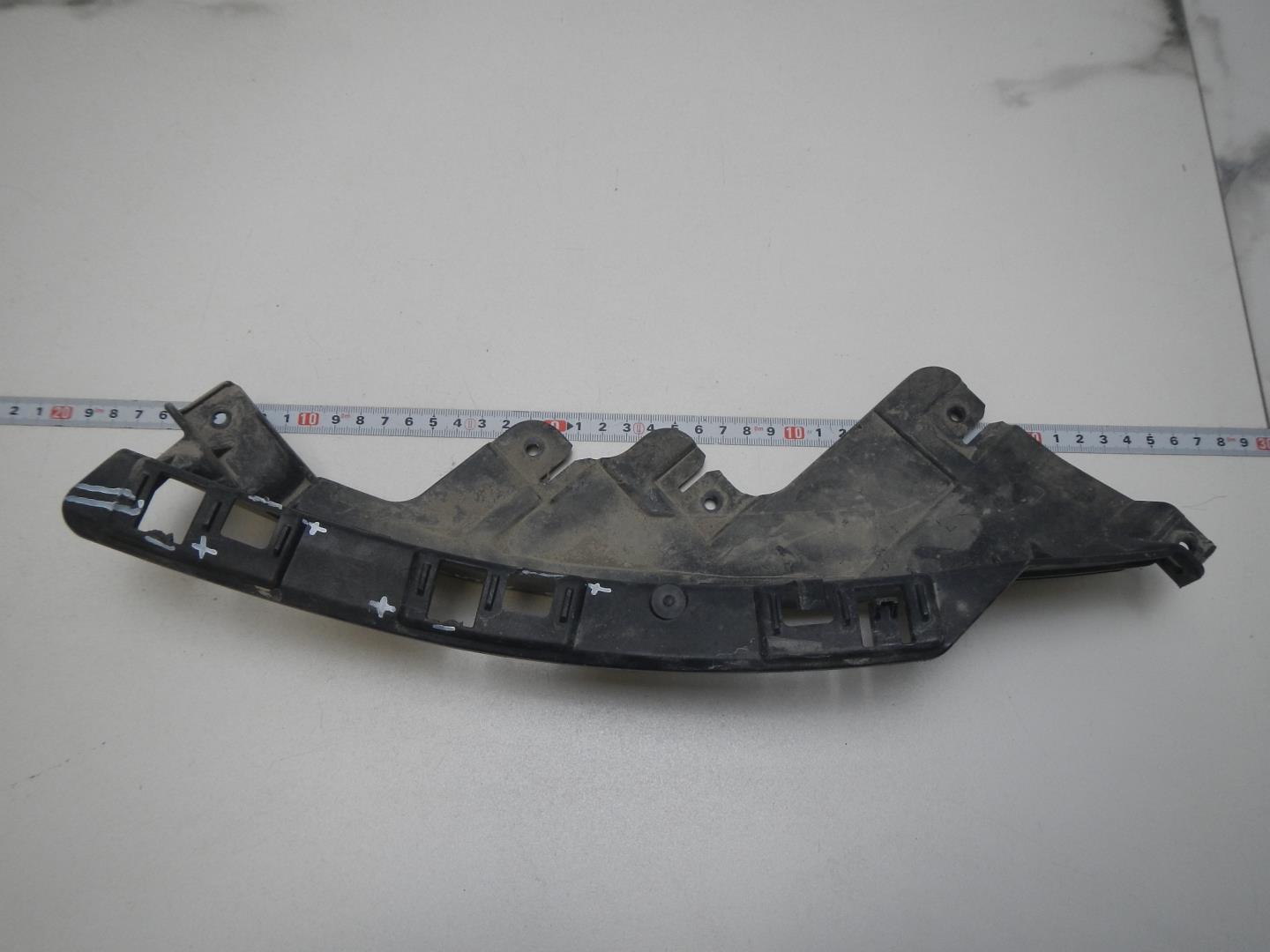 Кронштейн фар левый