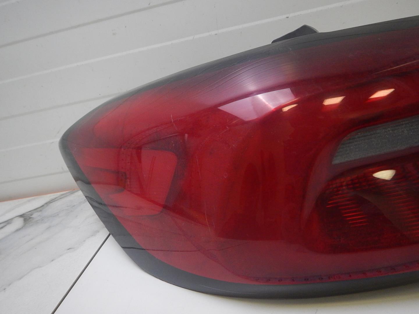 Фонарь задний левый