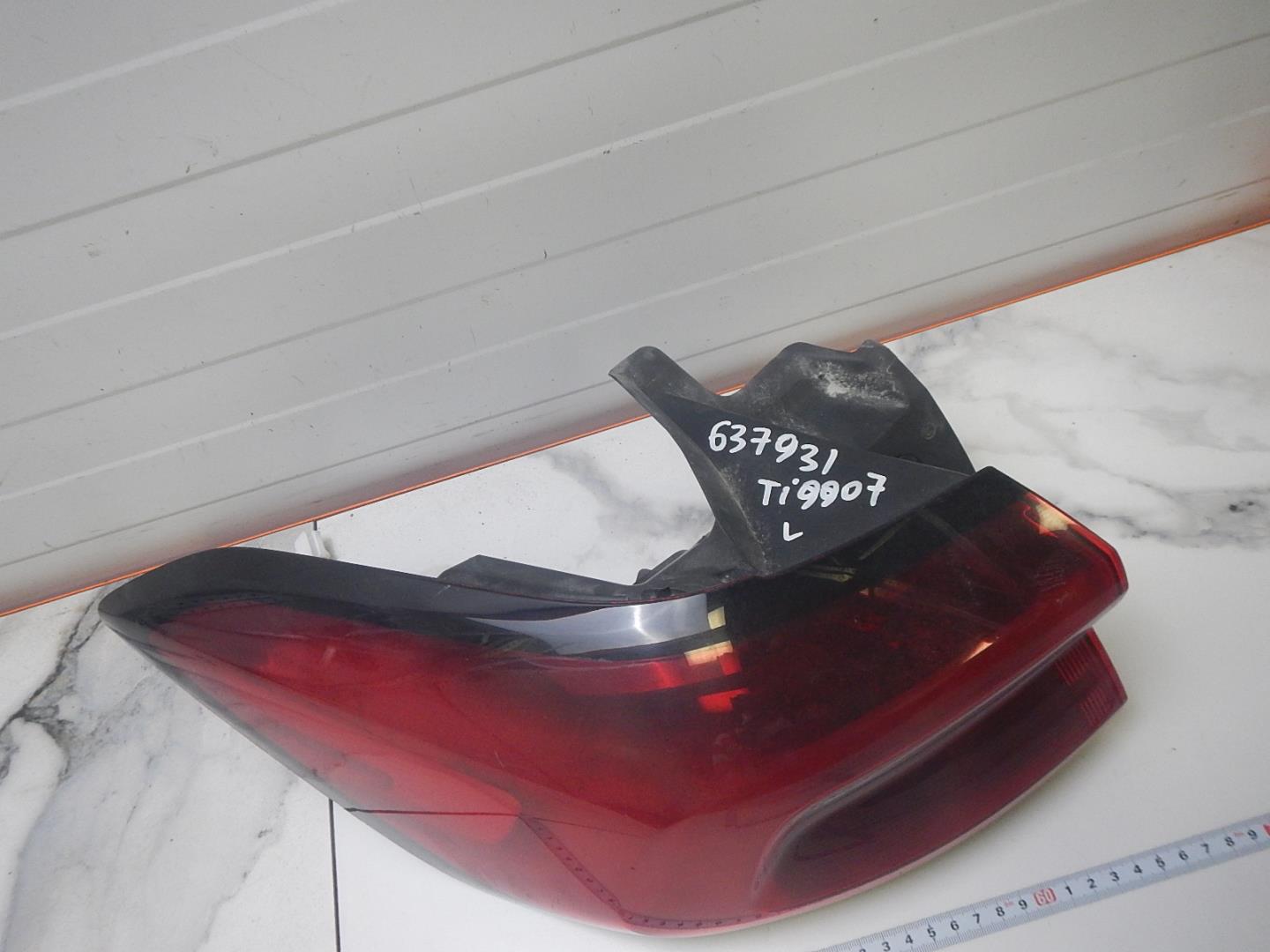 Фонарь задний левый