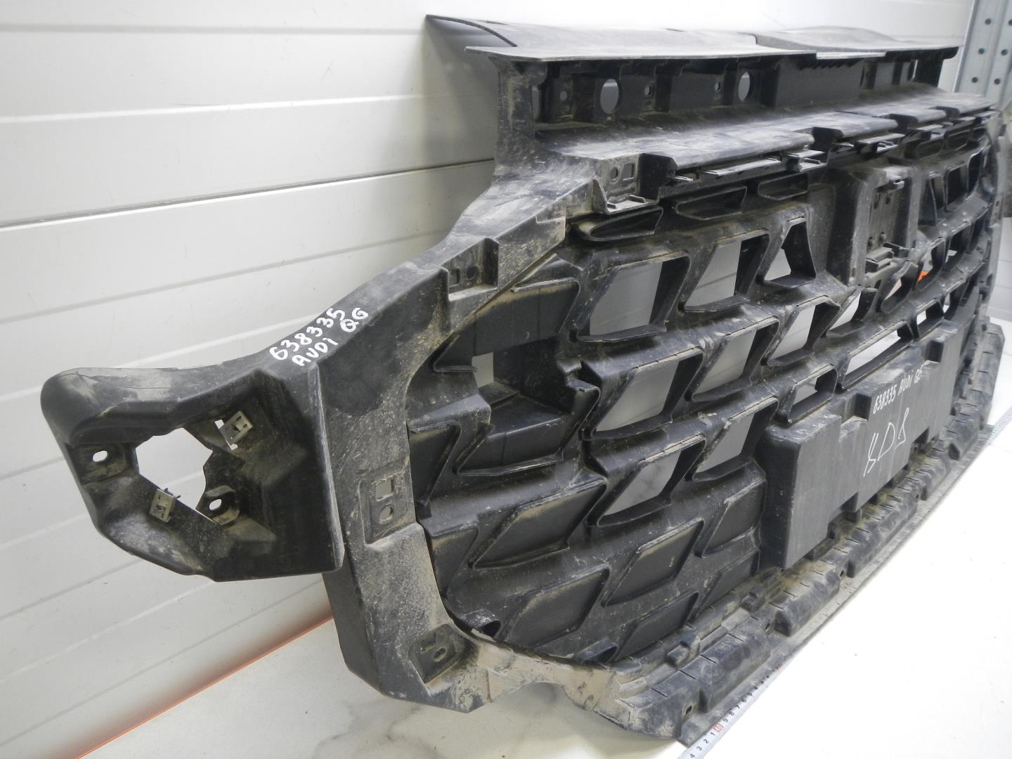 Кронштейн решетки радиатора