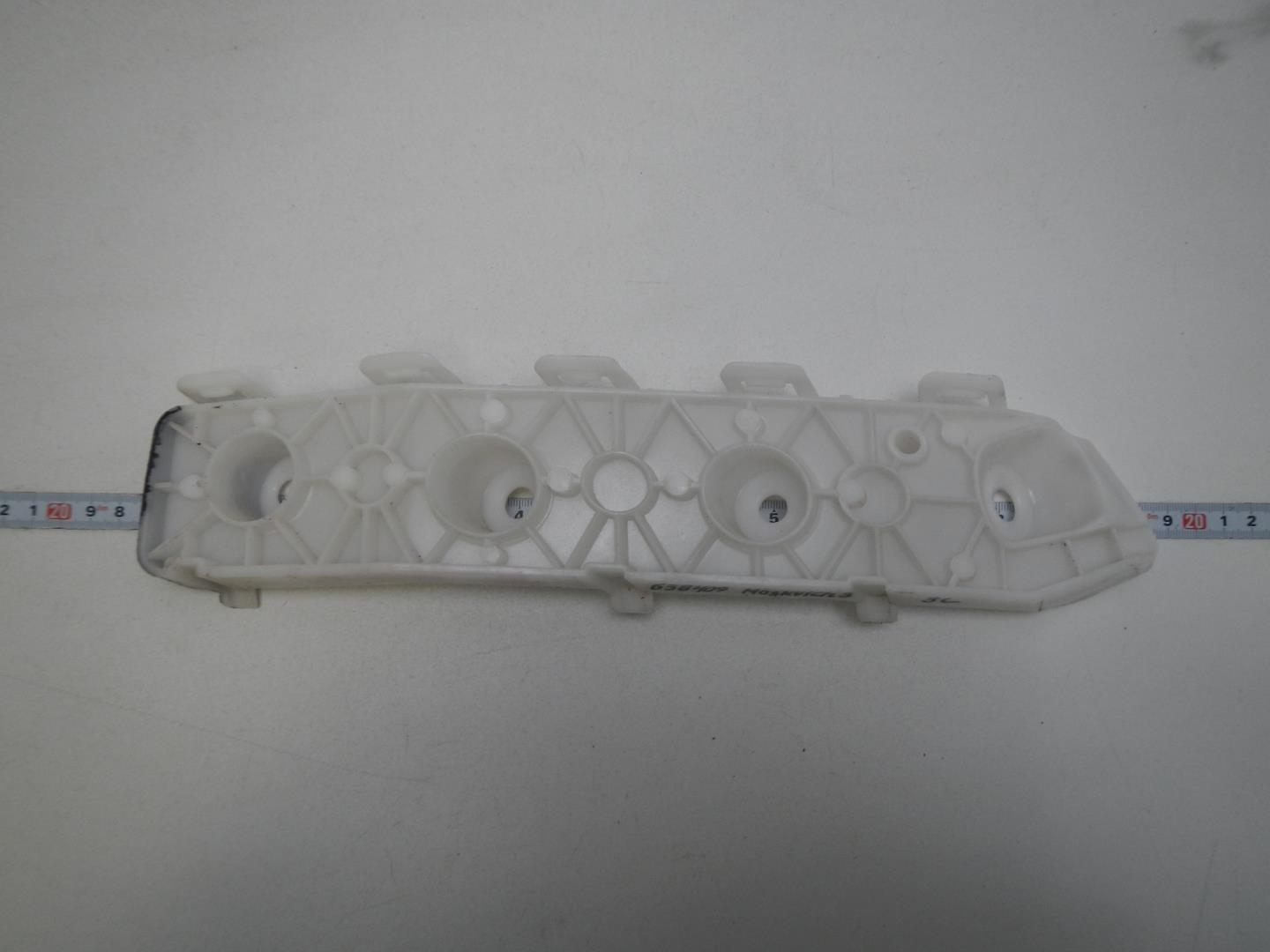 Кронштейн заднего бампера левый