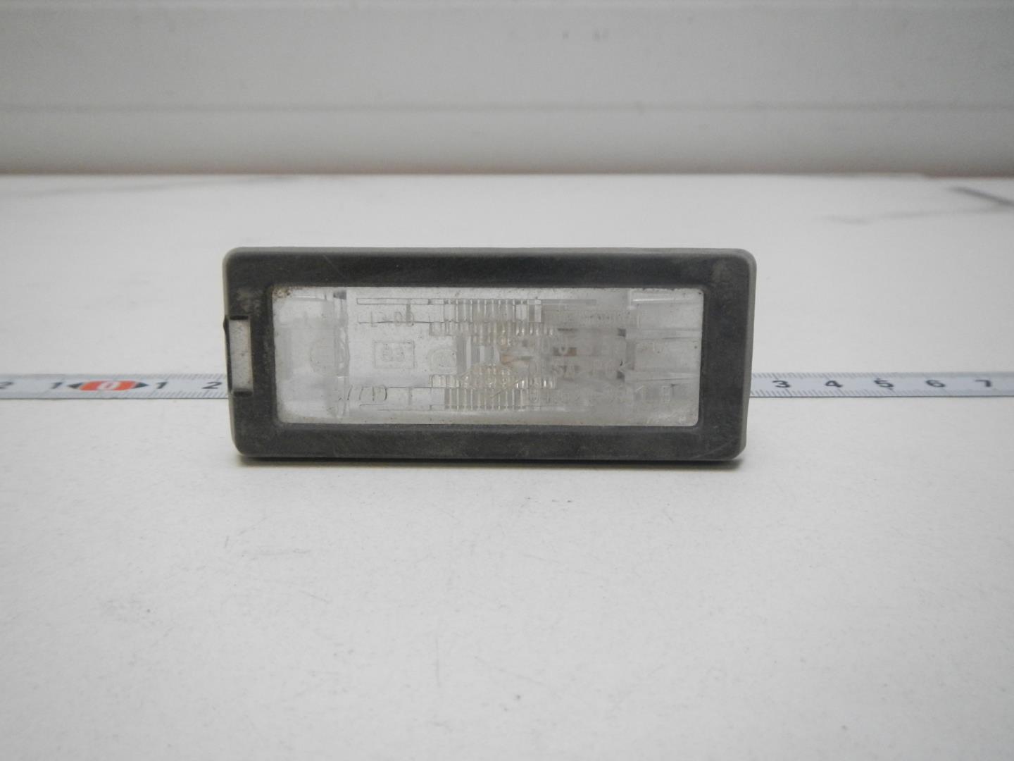 Фонарь подсветки номера