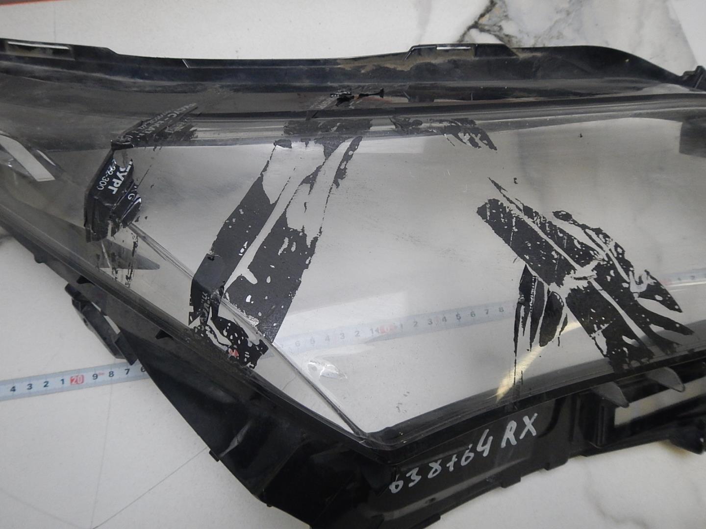 Стекло фары правой