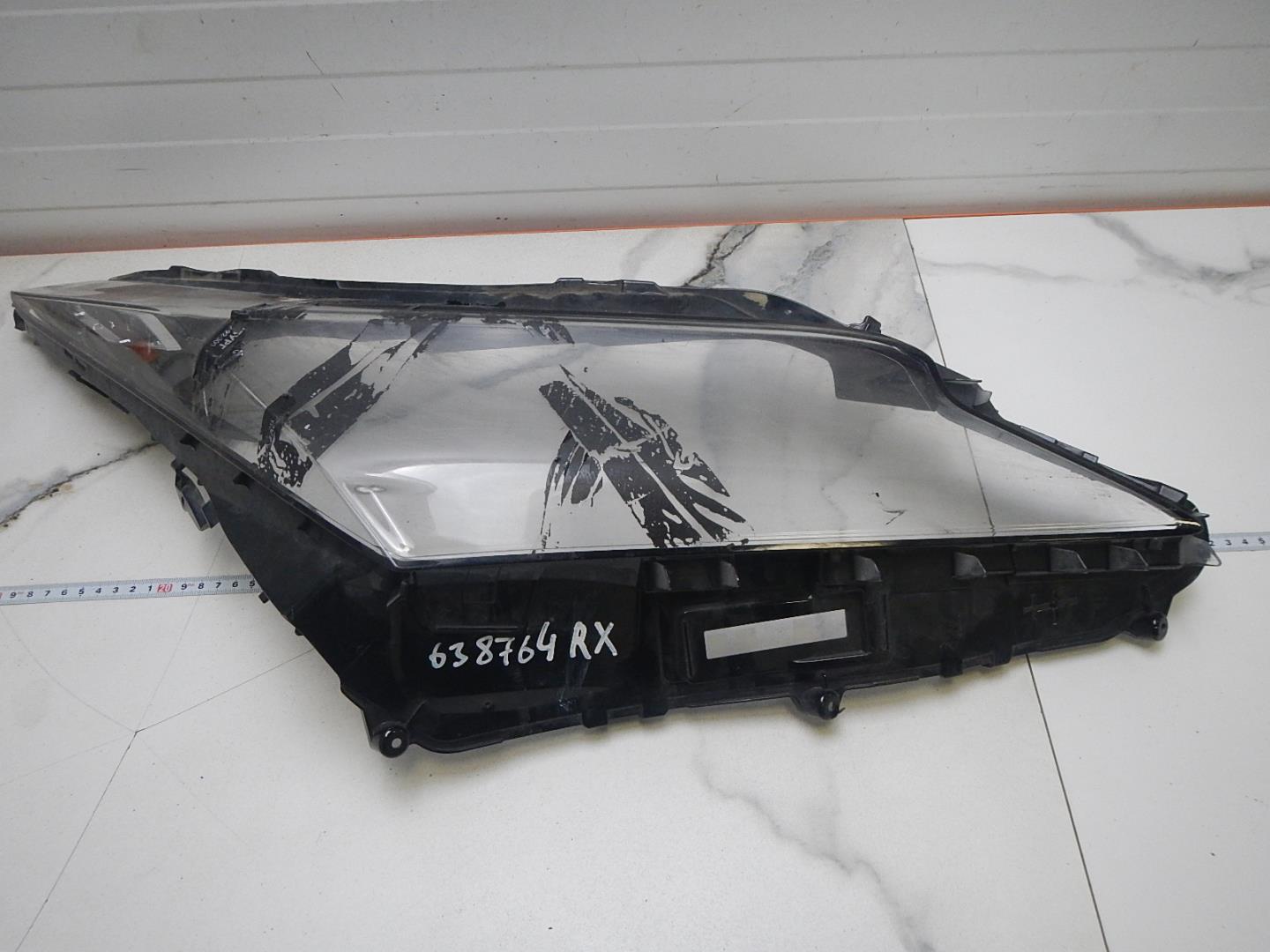 Стекло фары правой