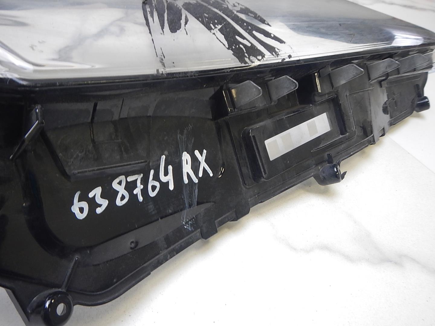 Стекло фары правой