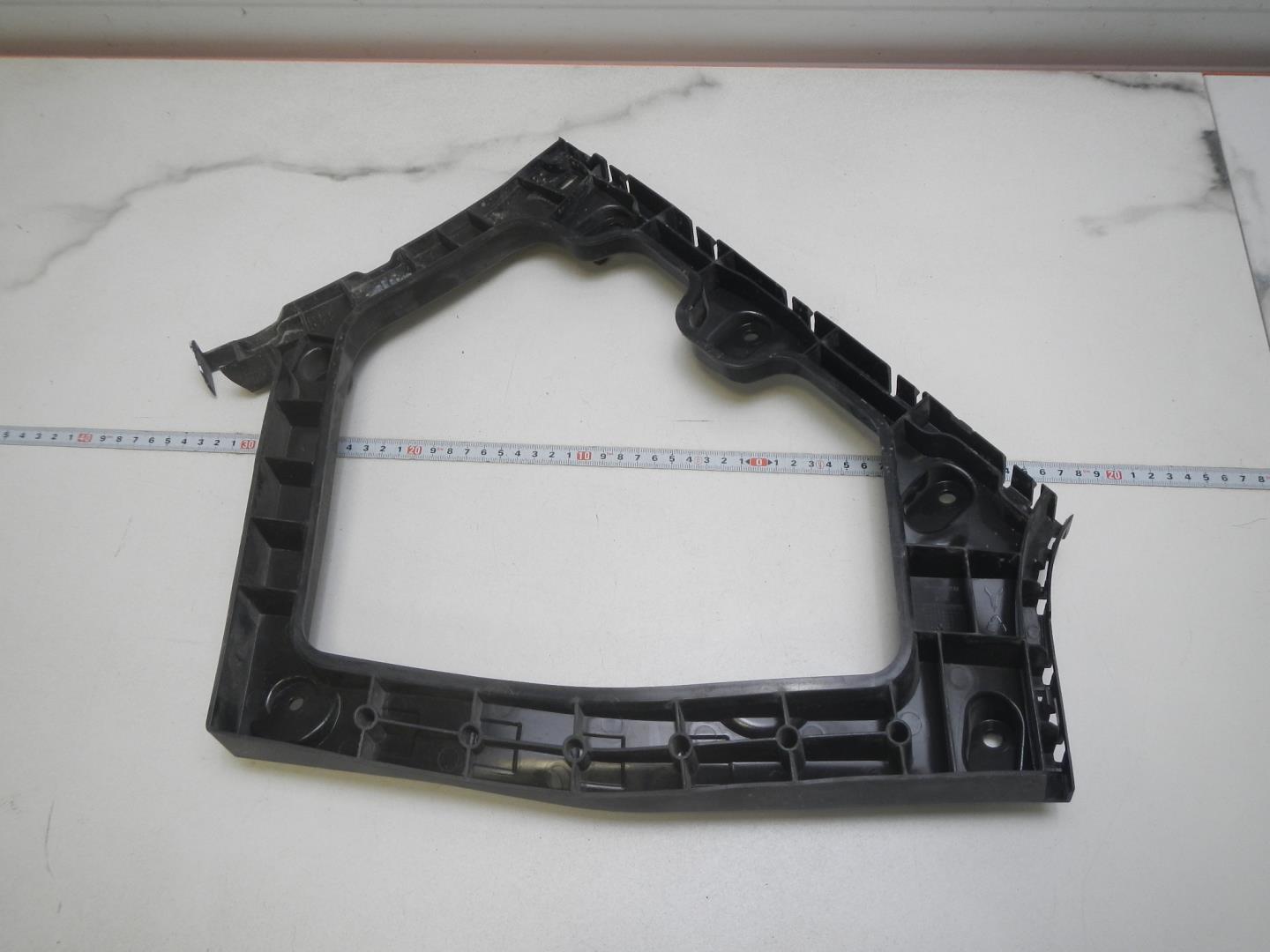 Кронштейн заднего бампера левый