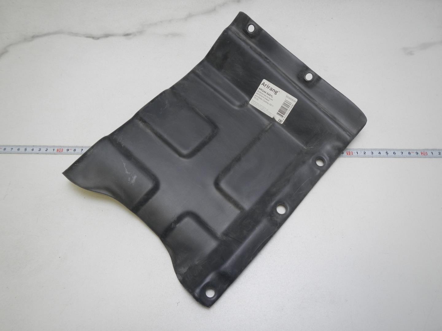 Пыльник двигателя боковой левый