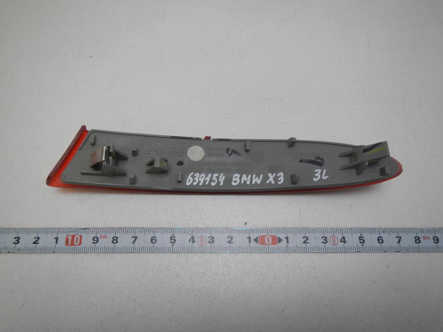 Отражатель в бампер задний левый