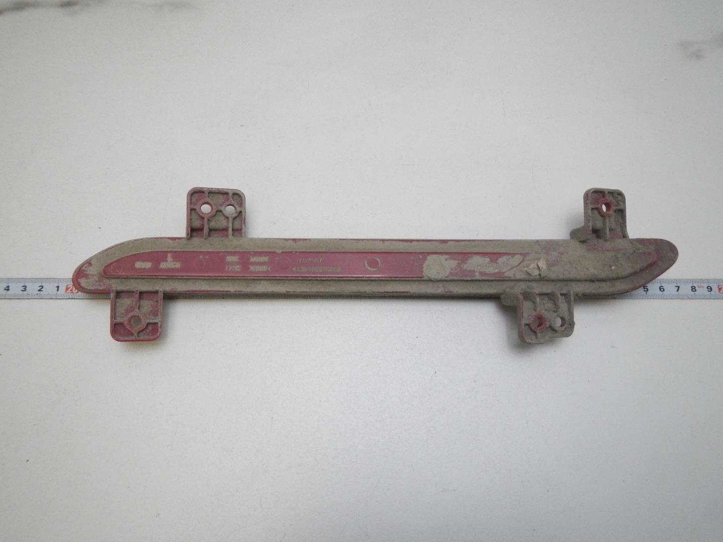 Отражатель в бампер задний левый