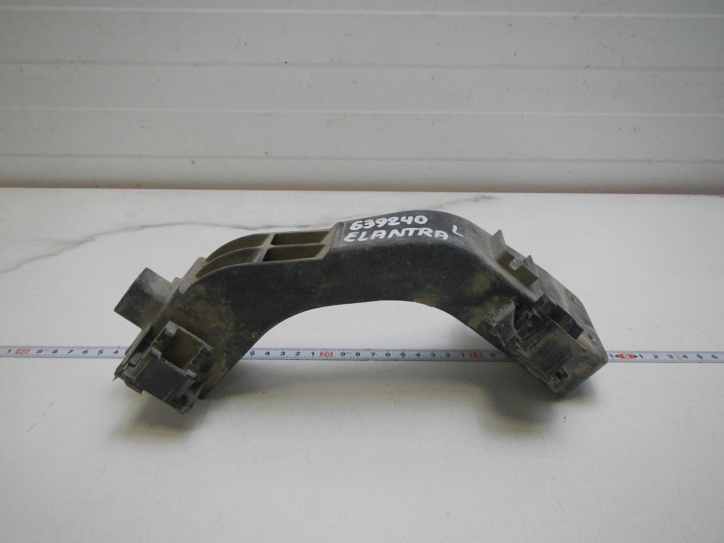 Кронштейн фар левый