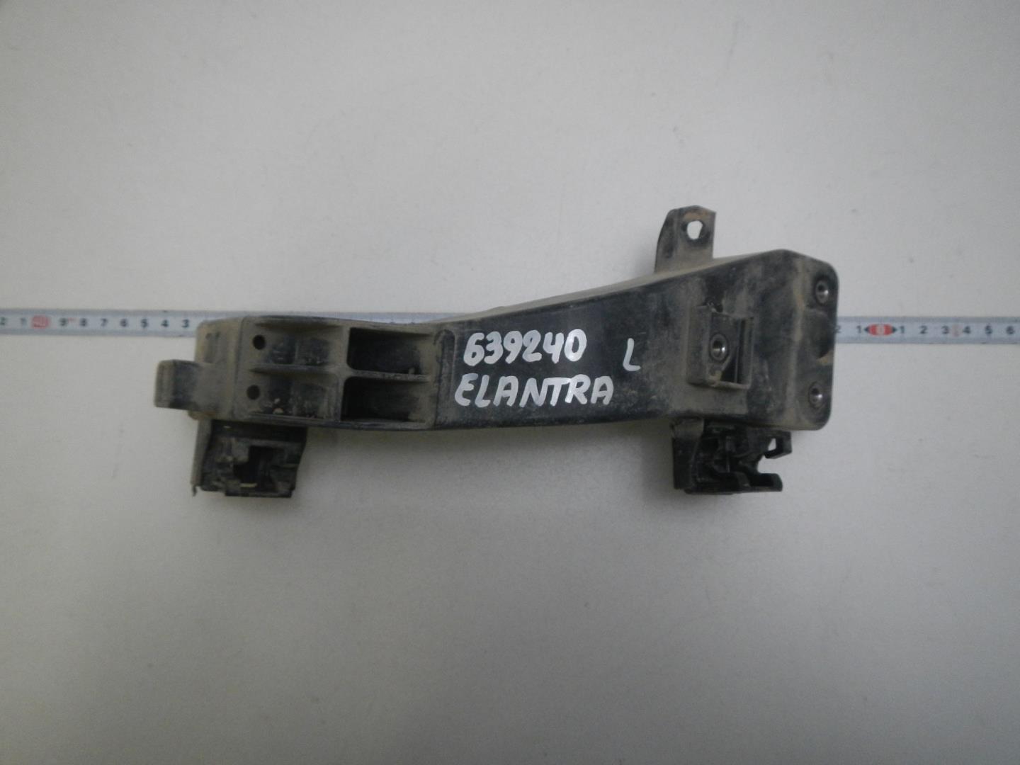 Кронштейн фар левый