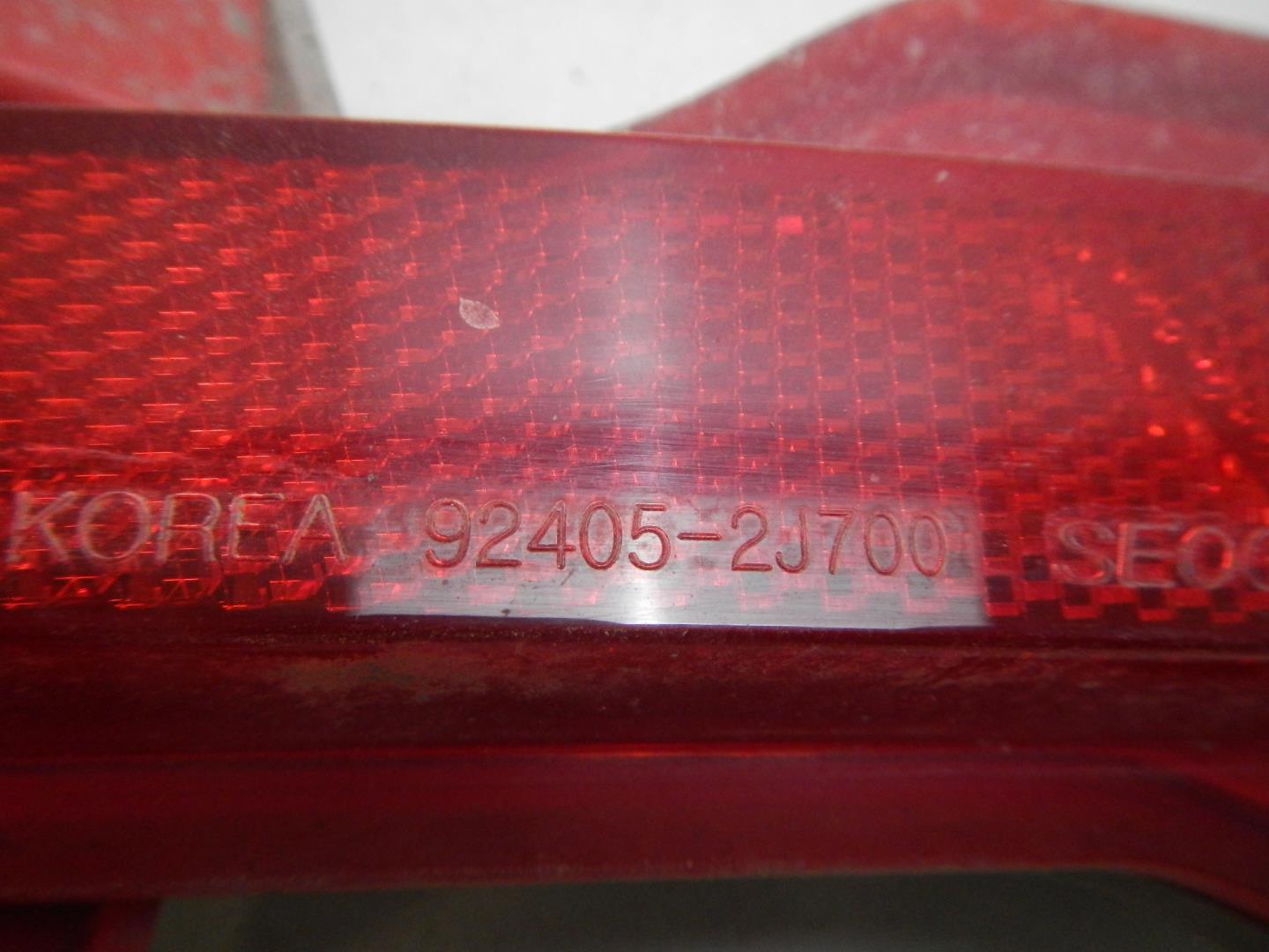 Отражатель в бампер задний левый