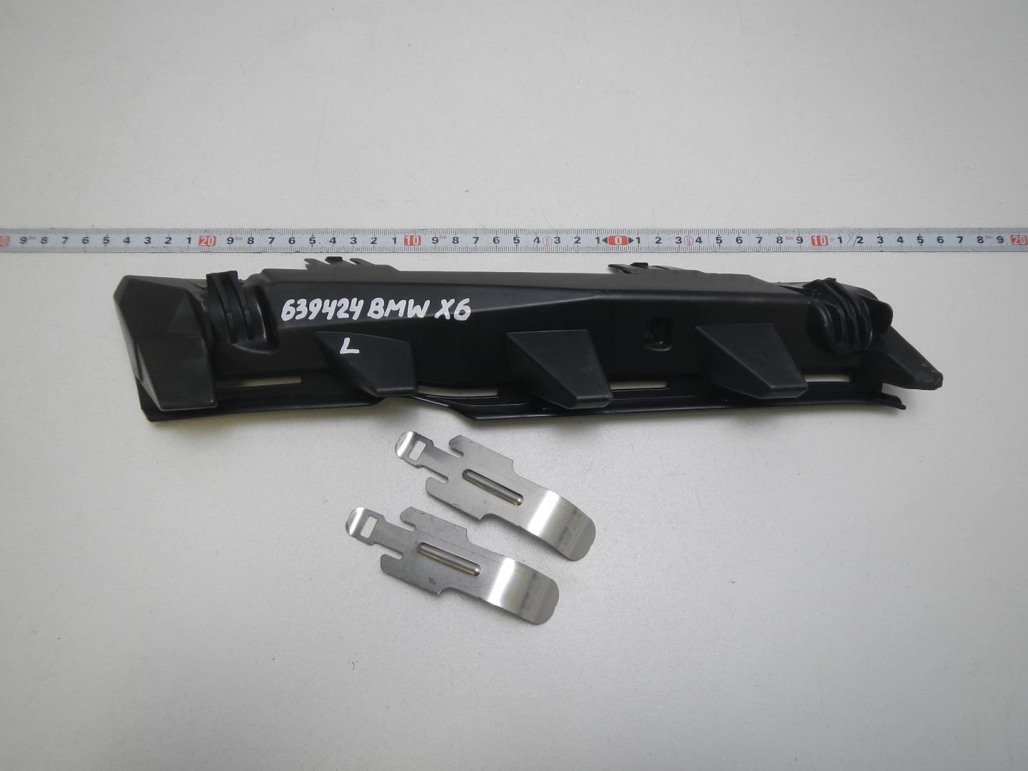 Кронштейн фар левый