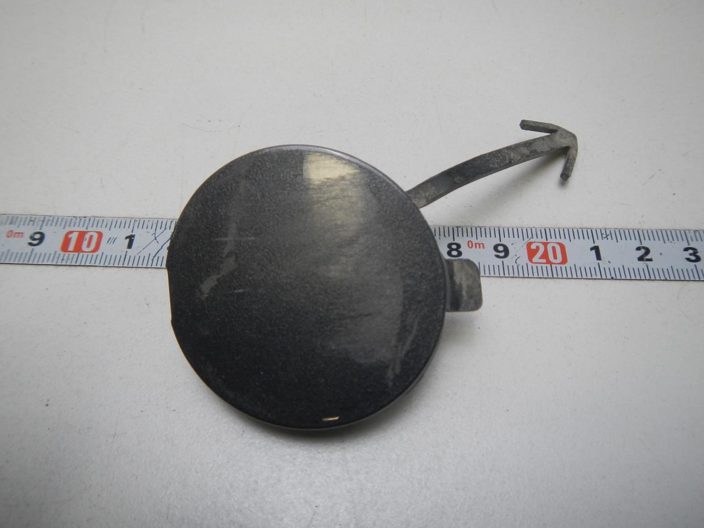 Заглушка буксировочного крюка