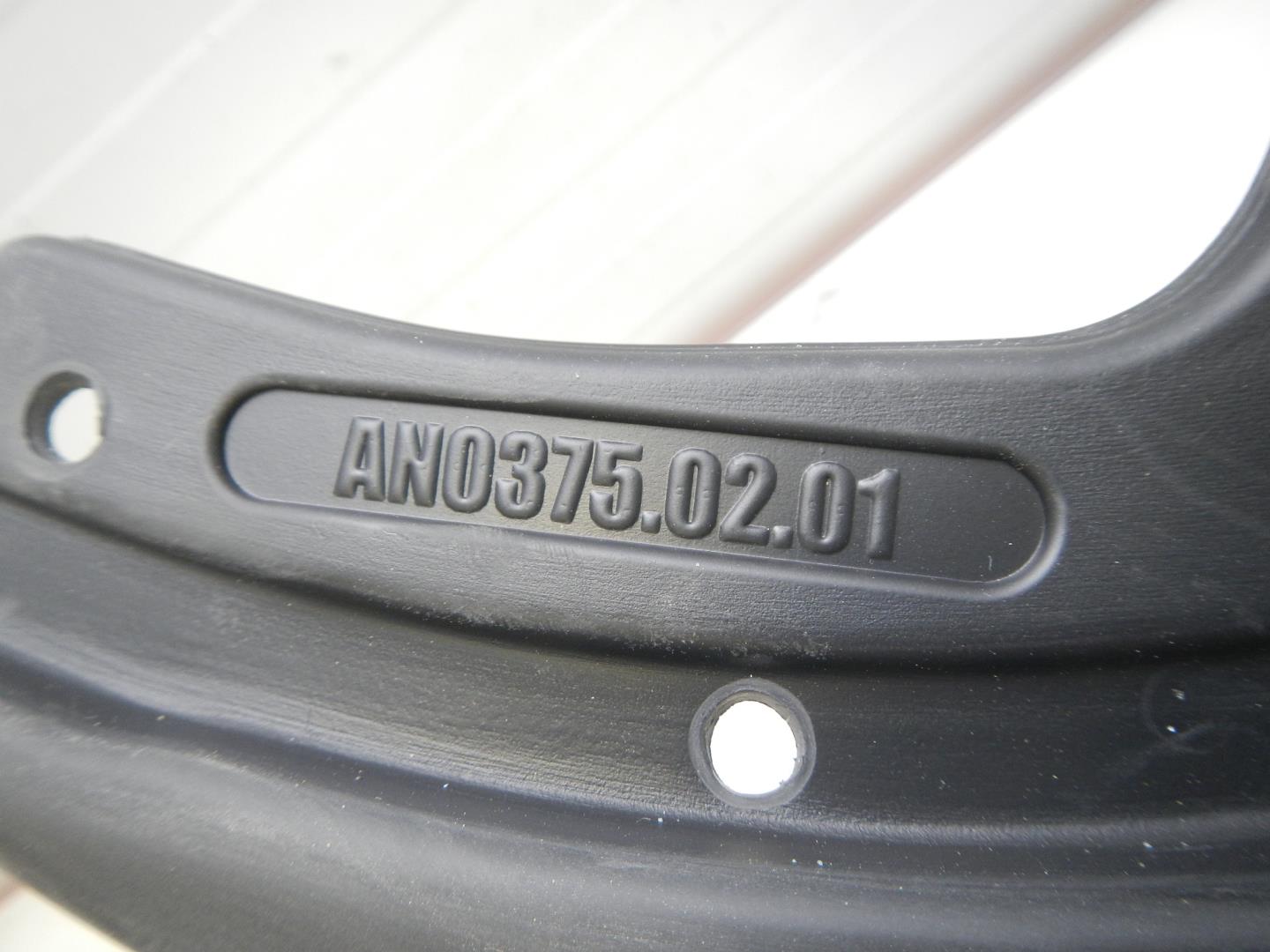 Брызговик задний левый