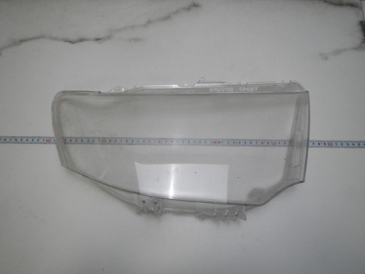 Стекло фары правой