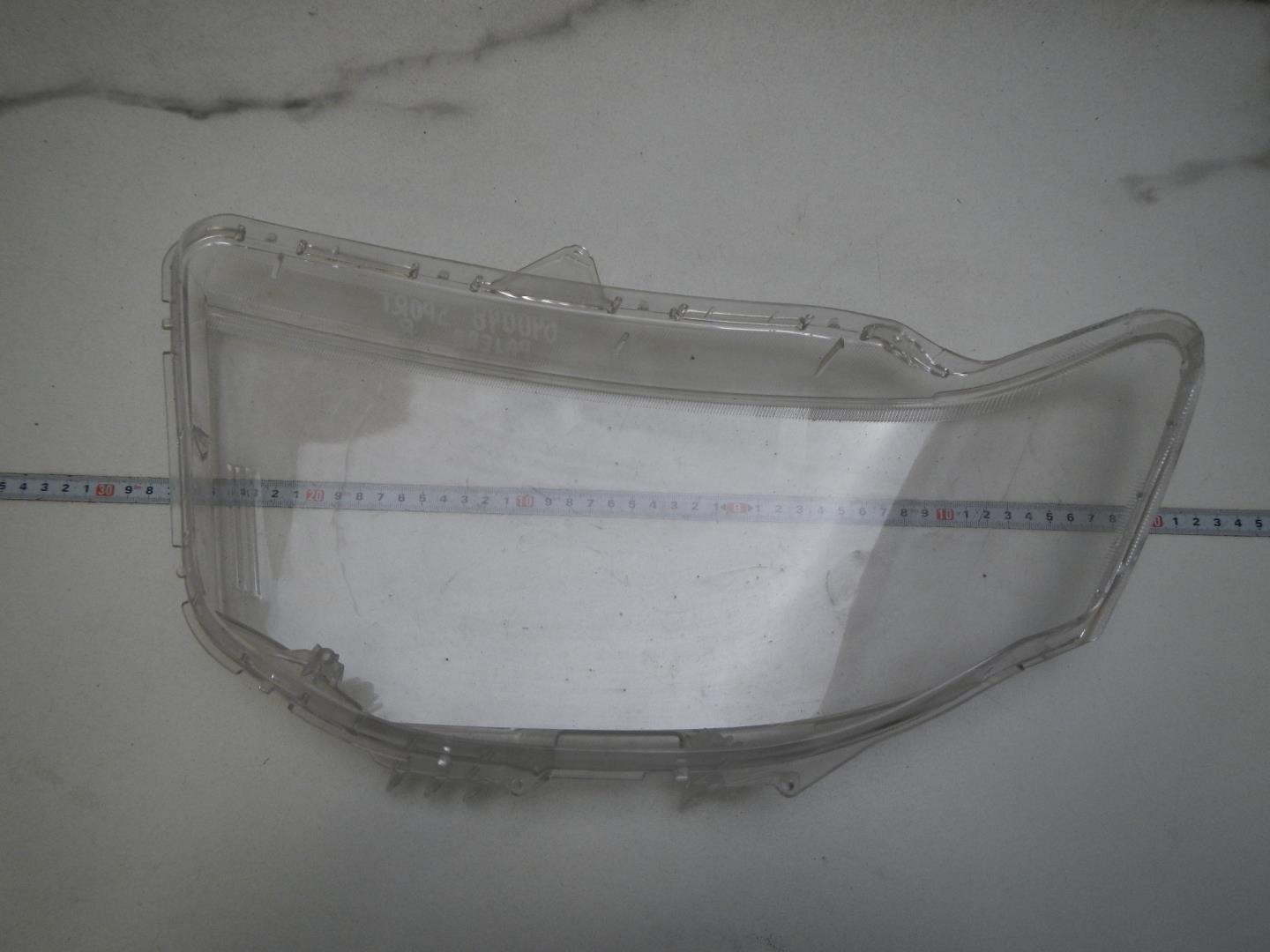 Стекло фары правой