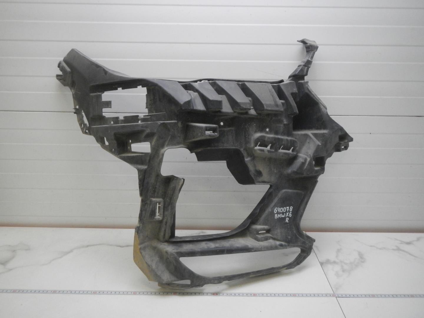 Кронштейн переднего бампера правый