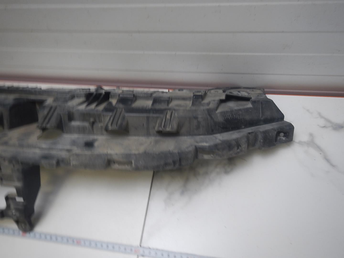 Кронштейн решетки радиатора