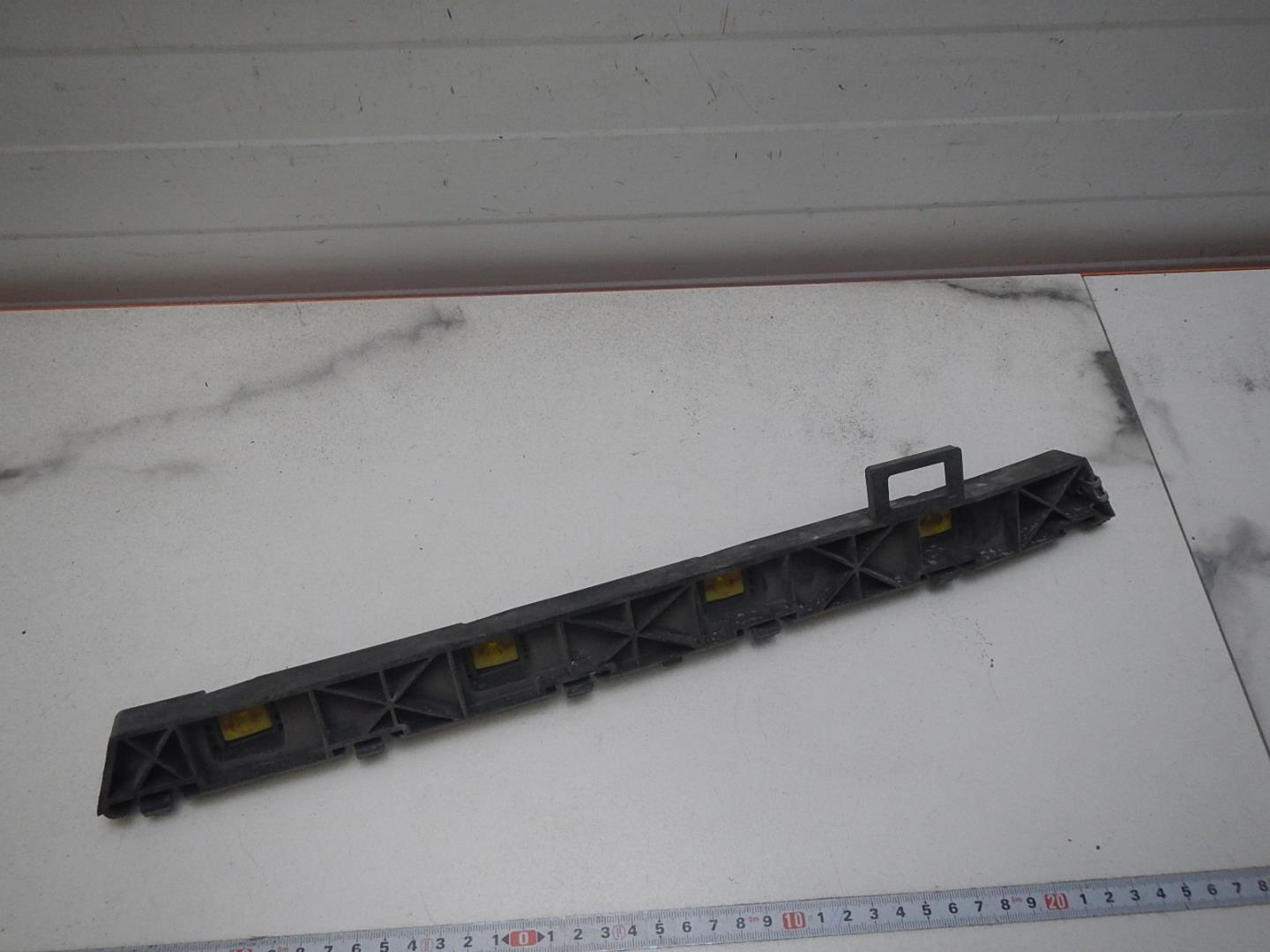 Кронштейн заднего бампера левый