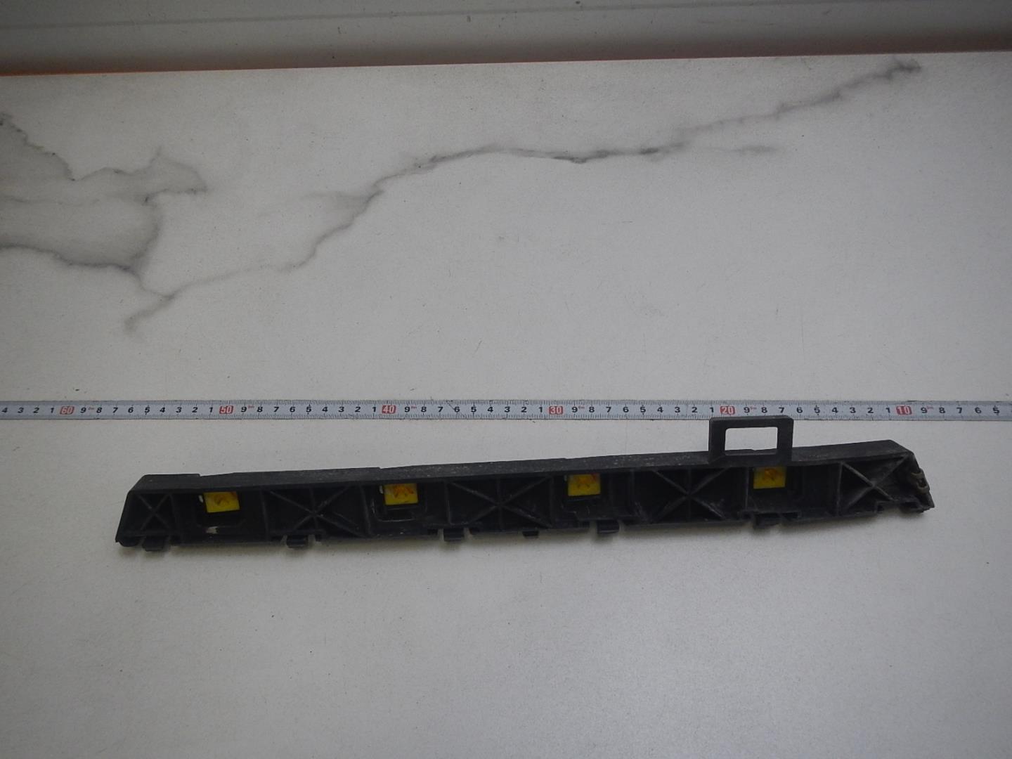 Кронштейн заднего бампера левый