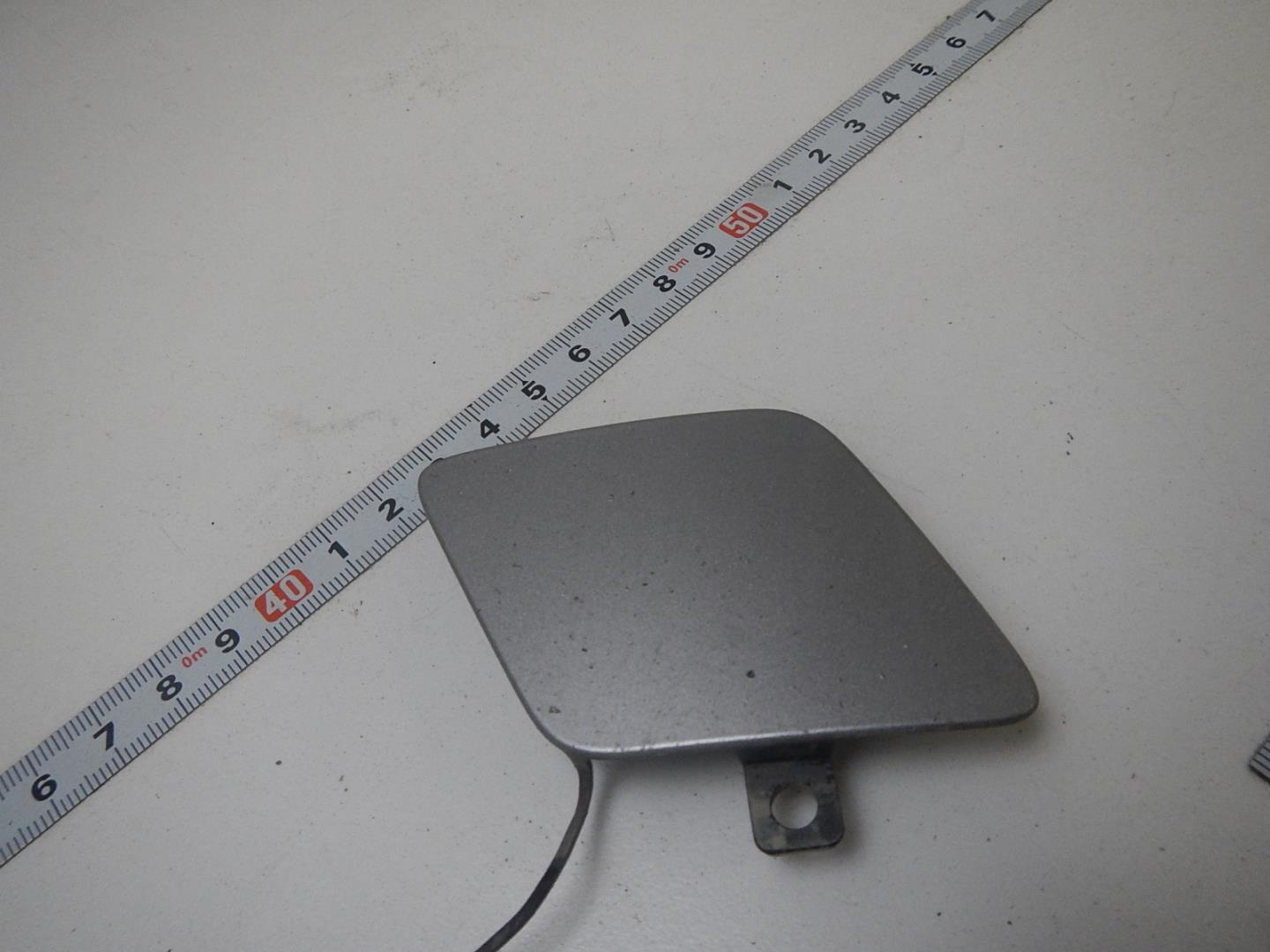 Заглушка буксировочного крюка