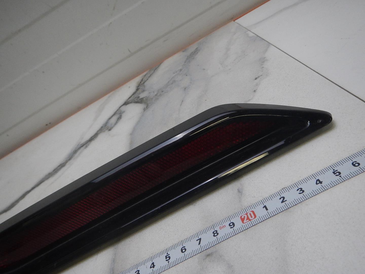 Отражатель в бампер задний левый