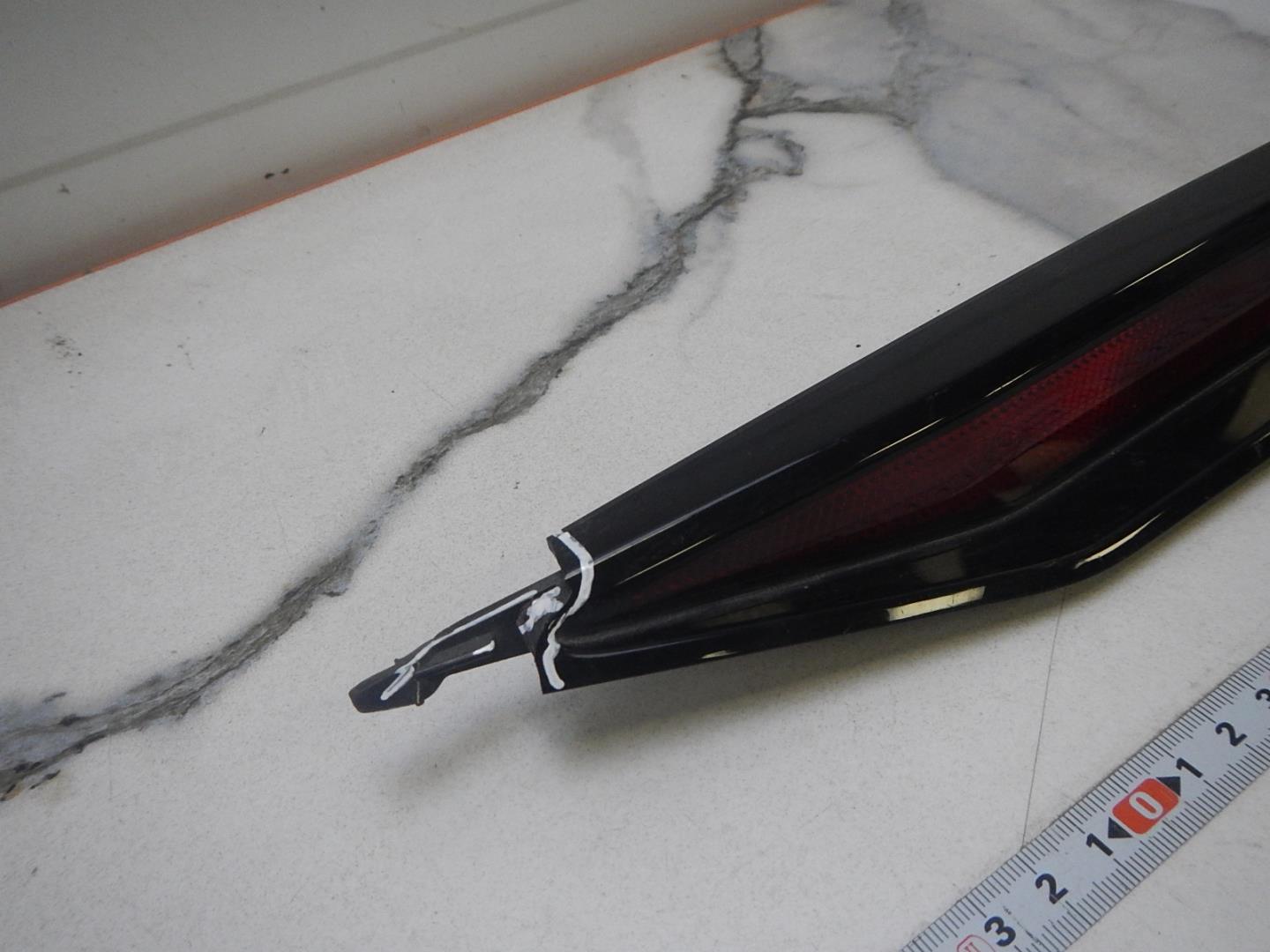 Отражатель в бампер задний левый