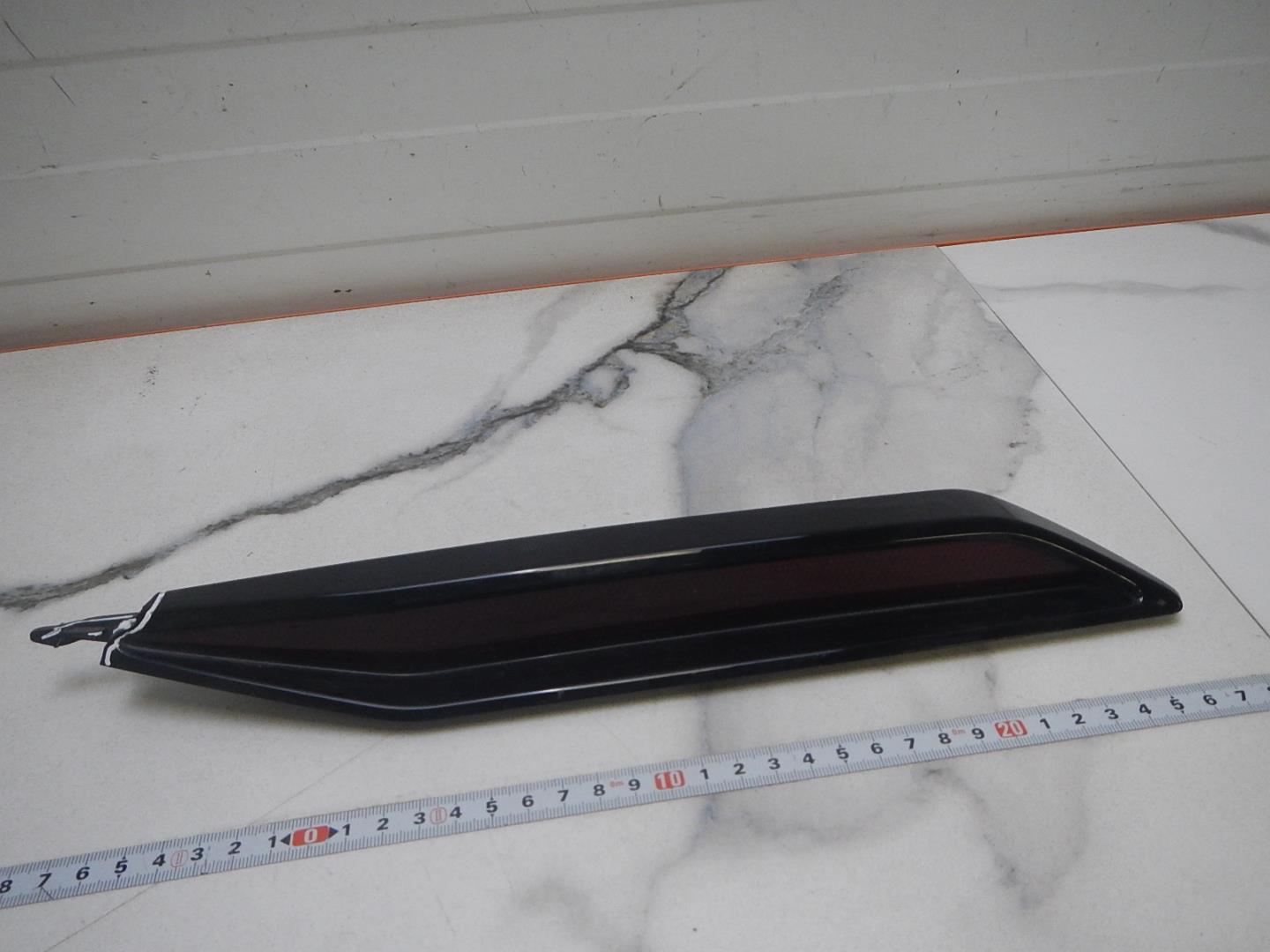 Отражатель в бампер задний левый