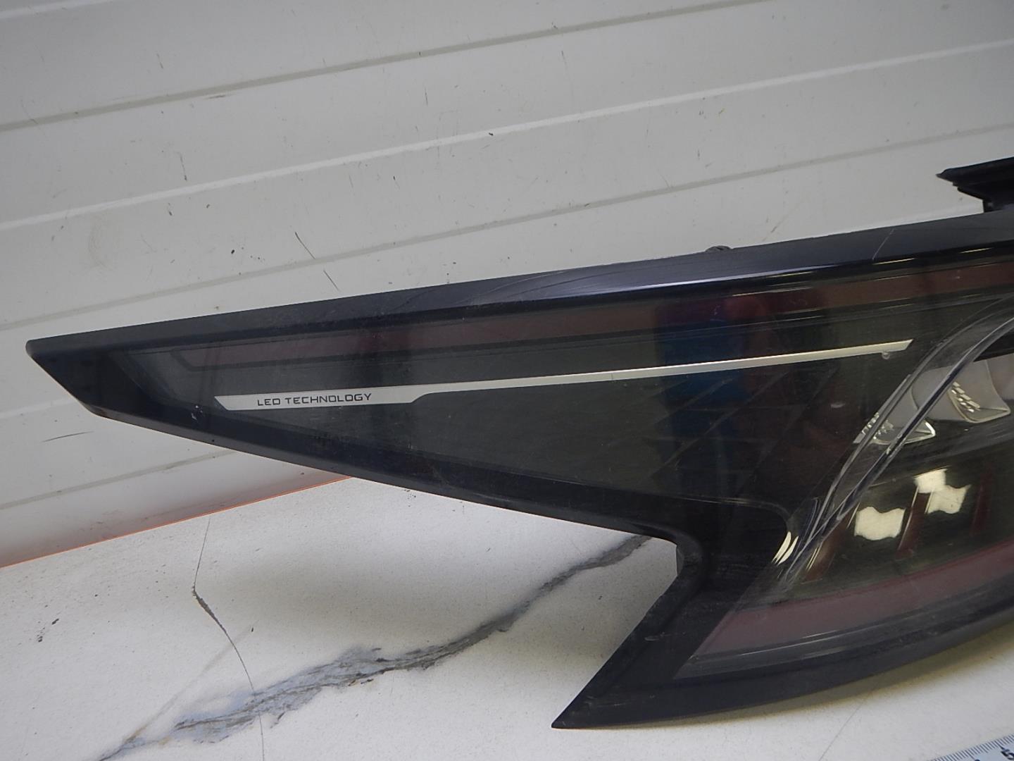 Фонарь задний левый