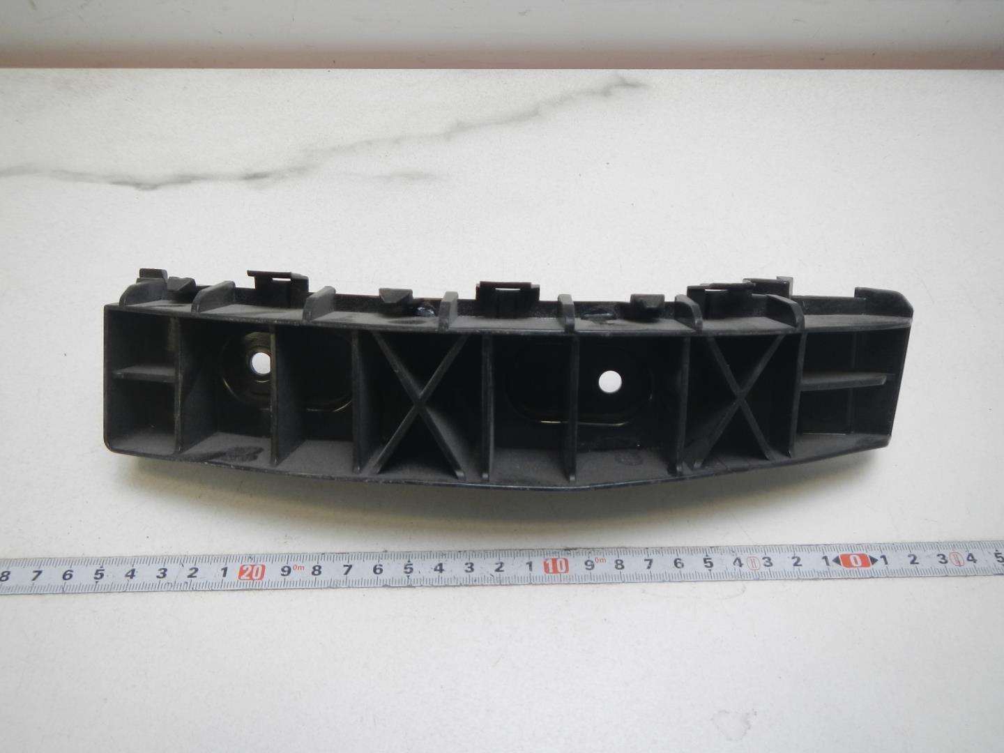 Кронштейн заднего бампера левый