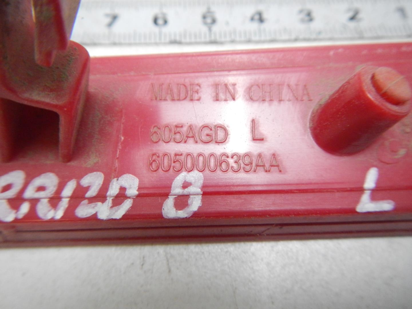 Отражатель в бампер задний левый