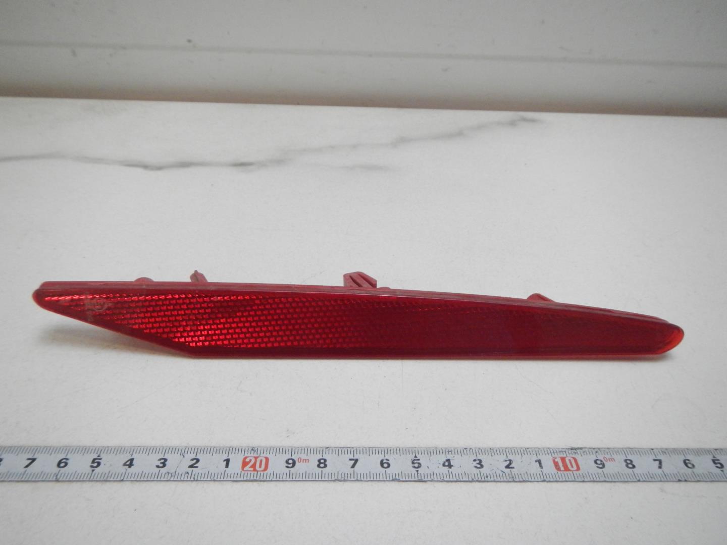 Отражатель в бампер задний левый