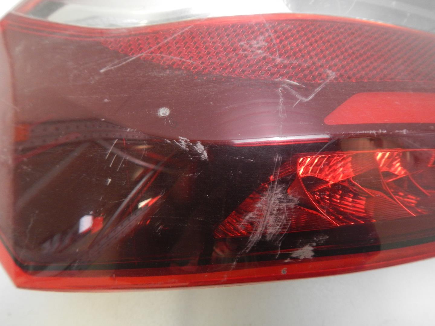 Фонарь задний левый