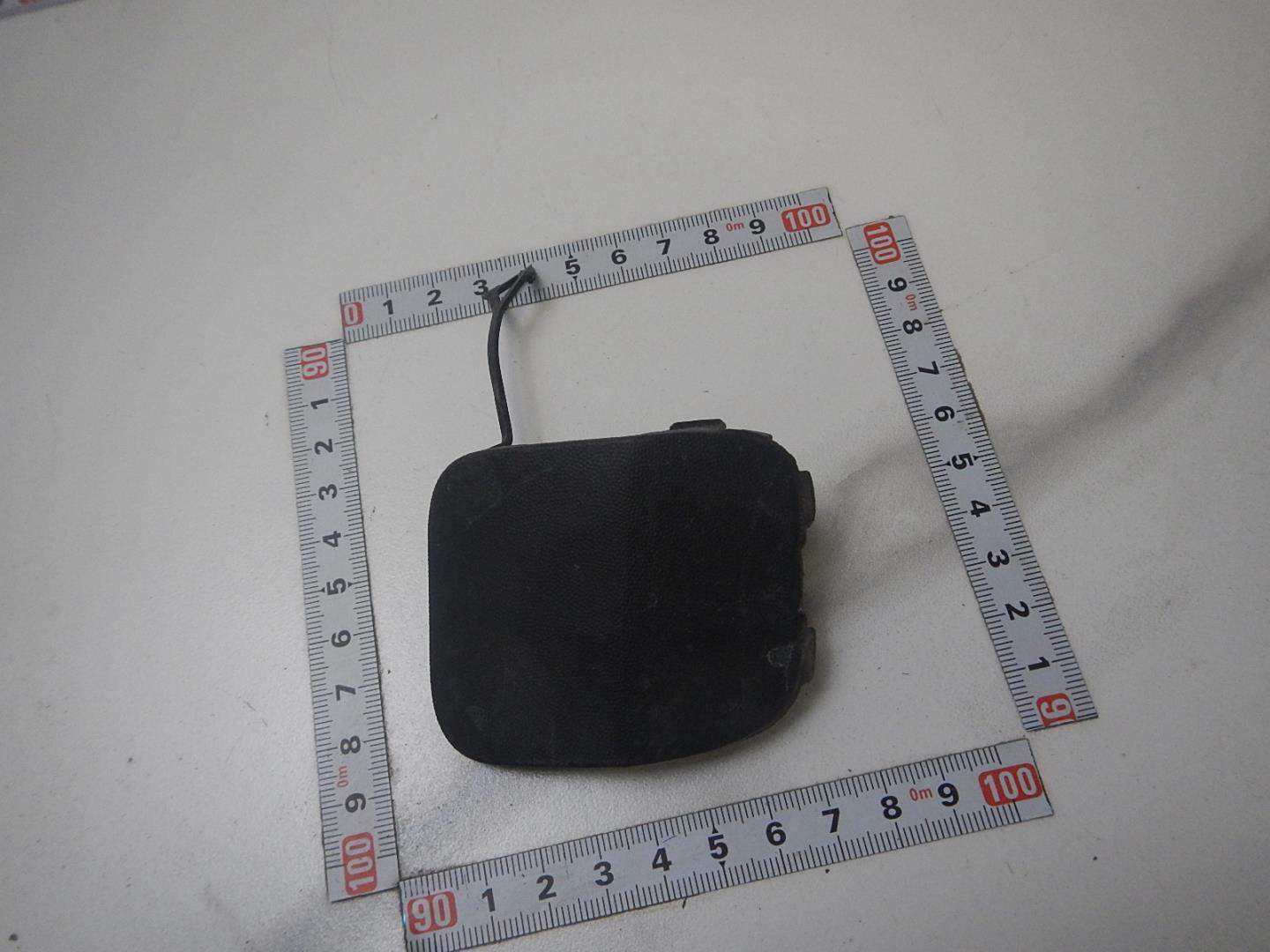 Заглушка буксировочного крюка