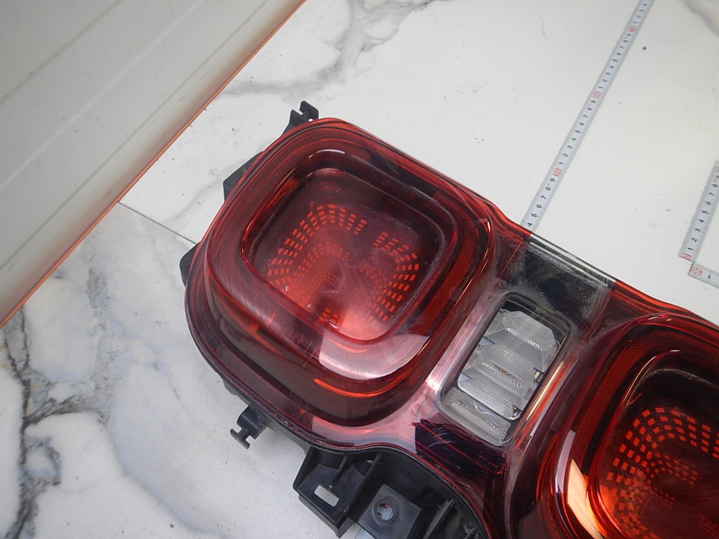 Фонарь задний левый