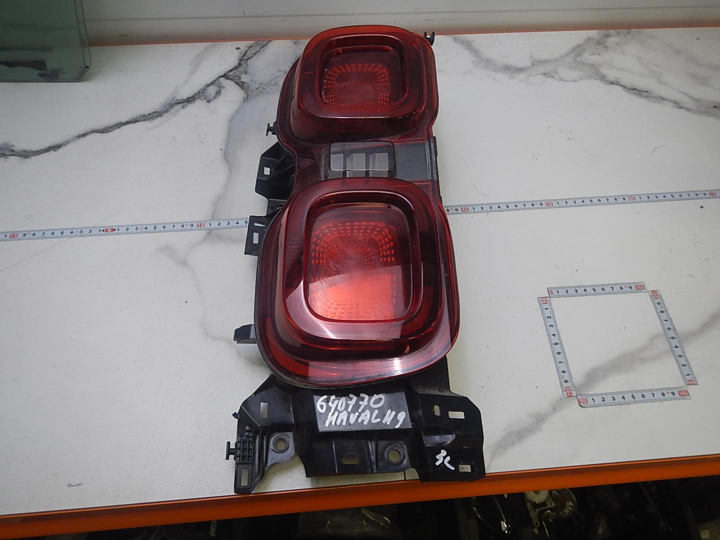 Фонарь задний левый