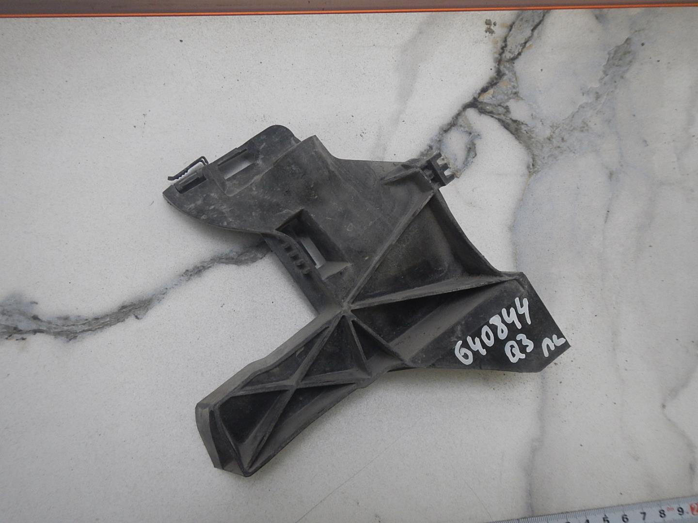 Кронштейн фар левый