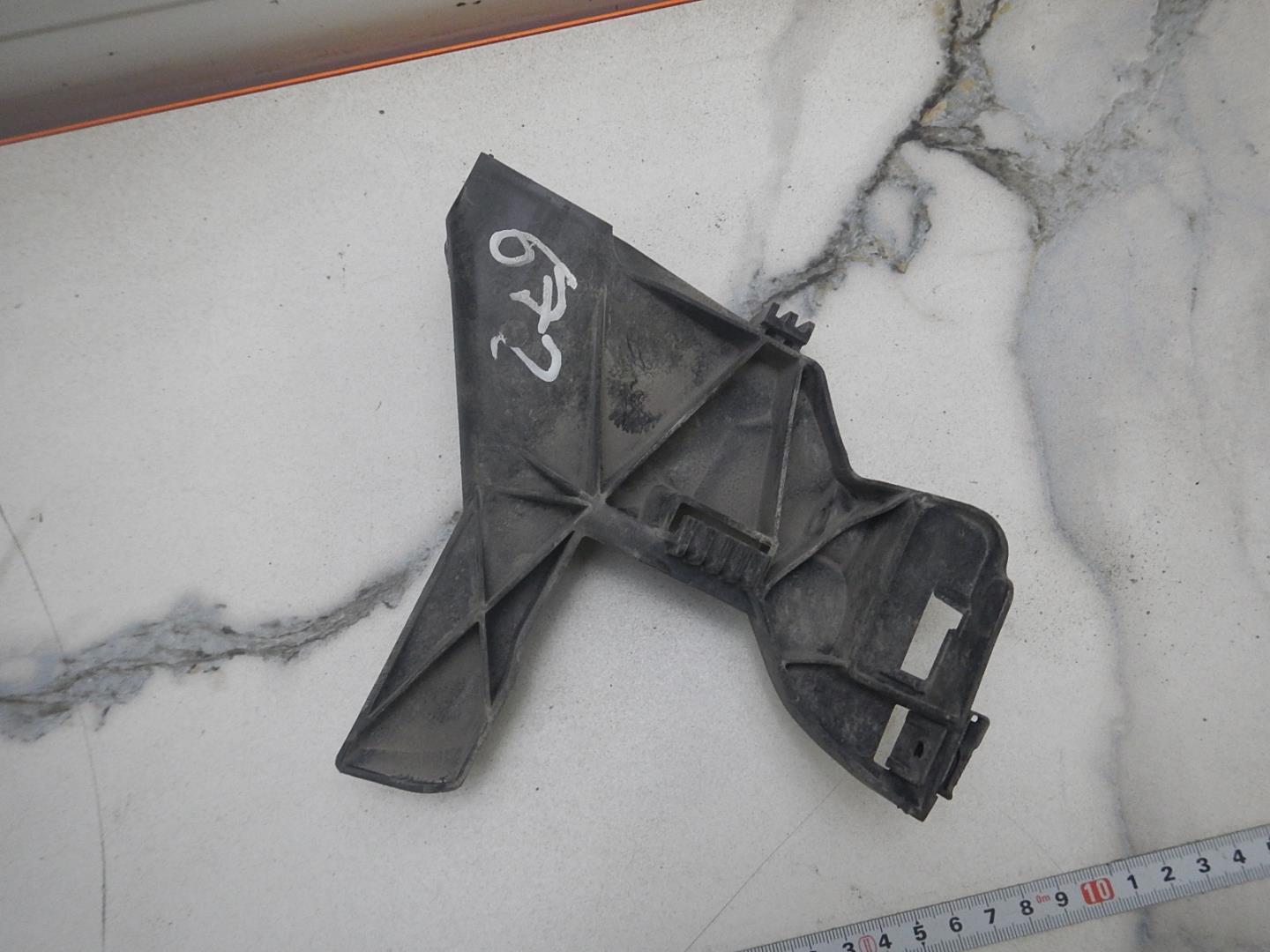 Кронштейн фар левый