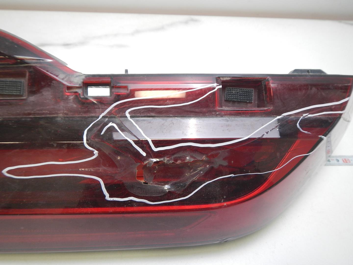 Фонарь задний левый