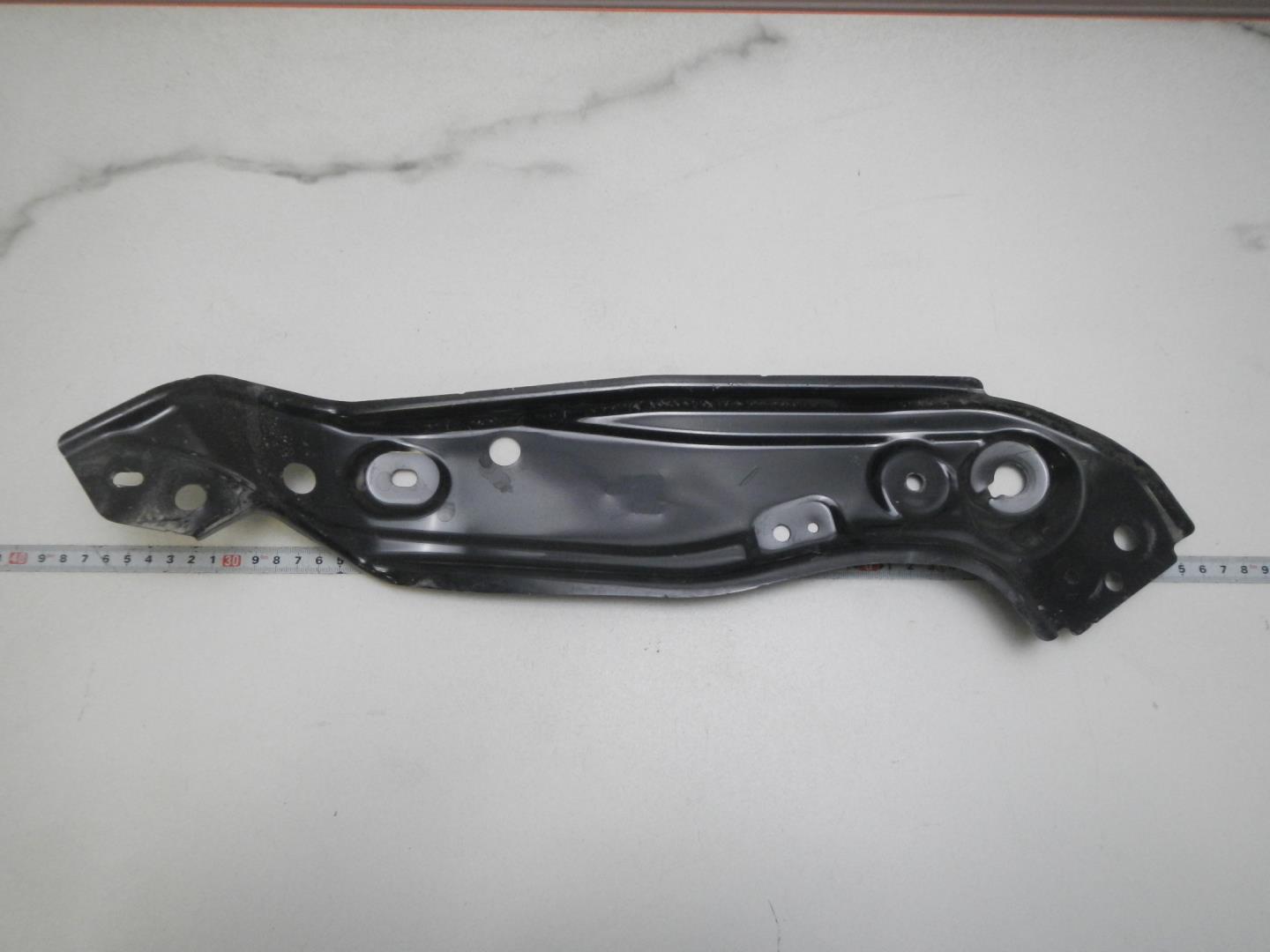 Кронштейн фар правый