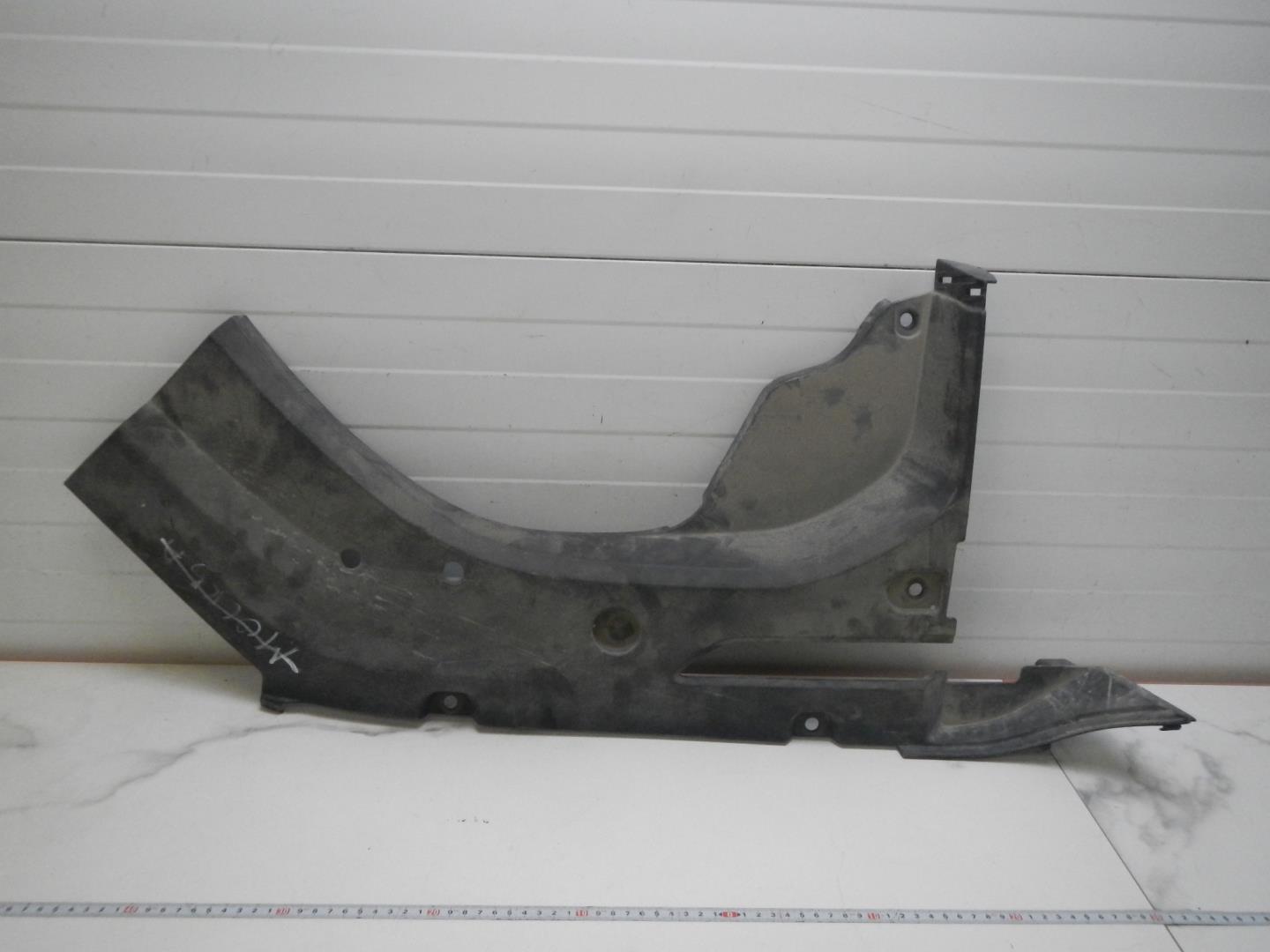 Пыльник двигателя боковой левый